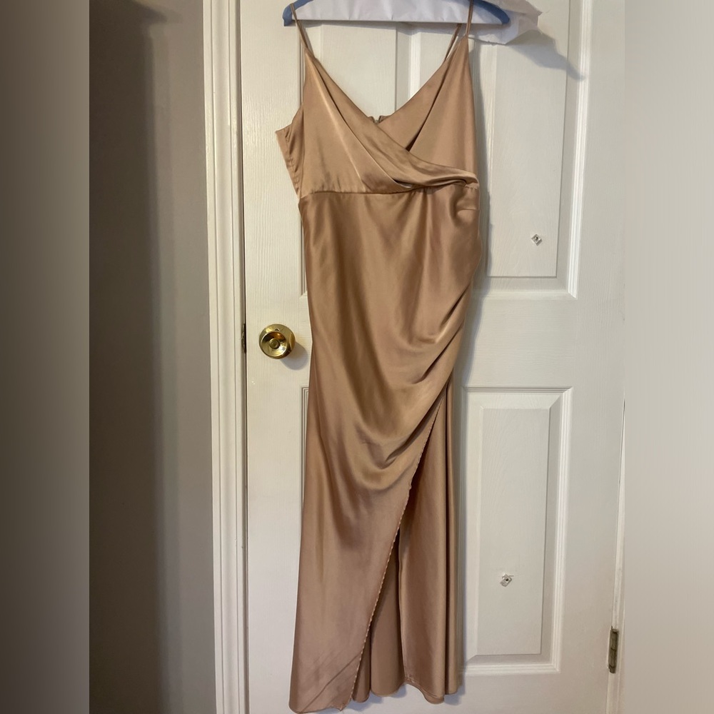 hello Molly, extra large satin beige dress worn as as a bridesmaids dress.